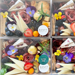 Individual Graze Box with Charcuterie, Cheeses, Fresh Fruits, Baguette, Edible Flowers. Regular, Gluten Free, Vegetarian, Dairy free and Gluten free options.